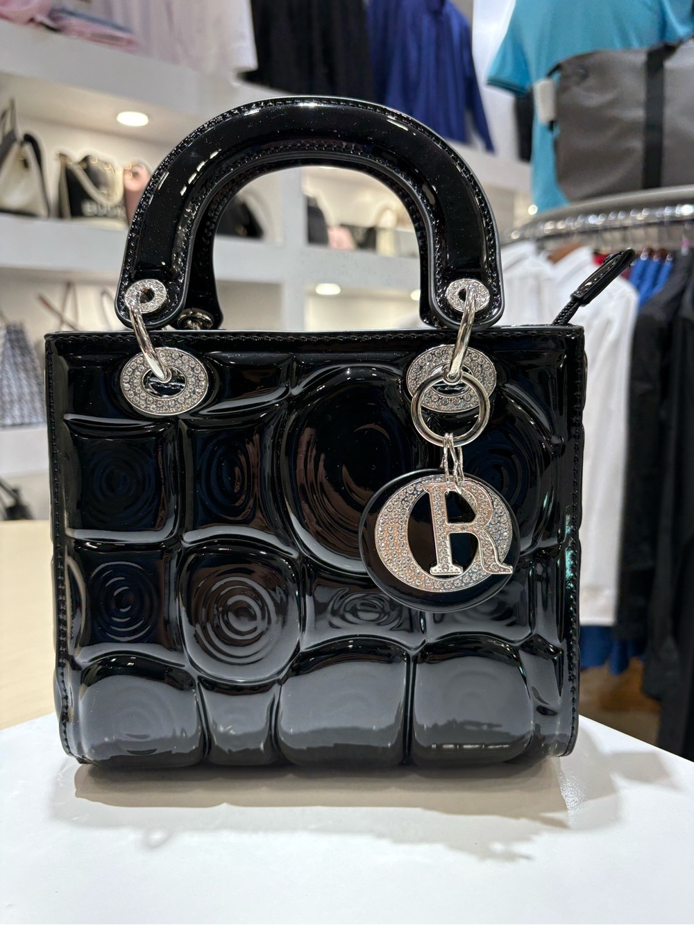 Black Patent Quilted Satchel with Silver Charm